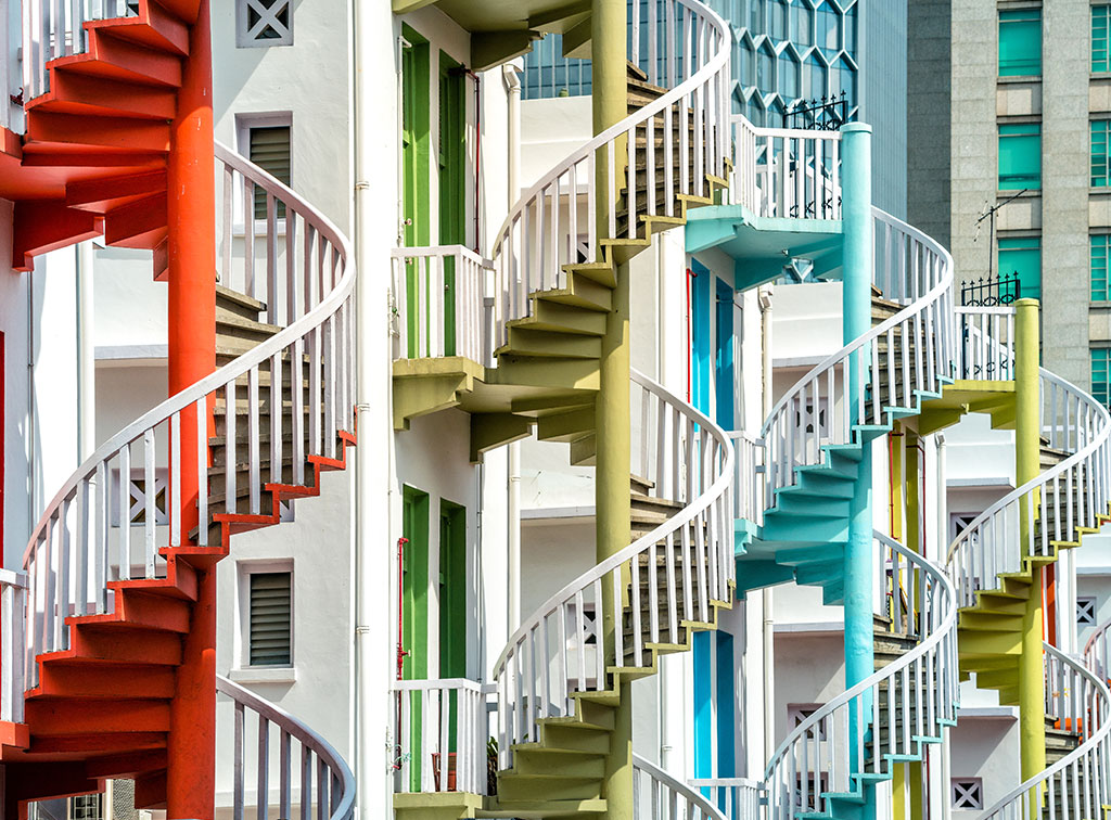 Multiple circular differing color stairs using industrial-grade stair nosings.